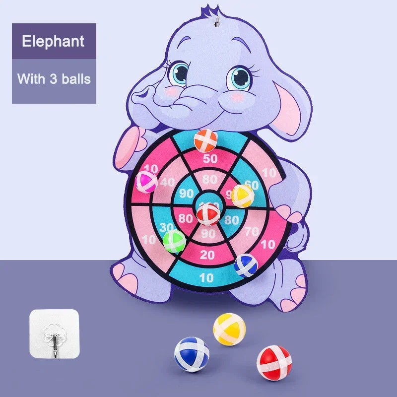 Children's dartboard shaped like an elephant with three balls on a purple background