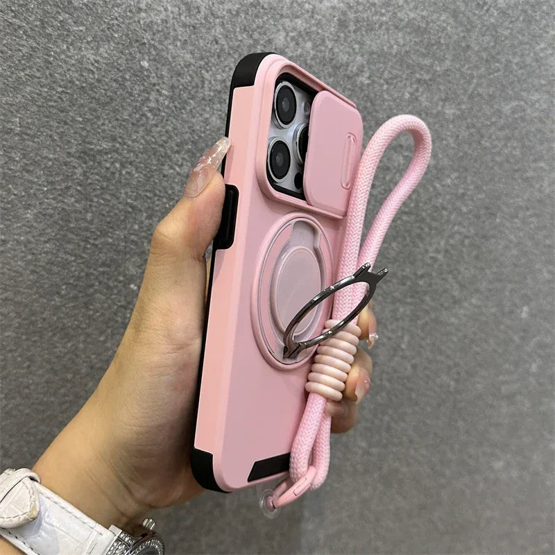 Pink phone case with a lanyard held by a hand against a gray background