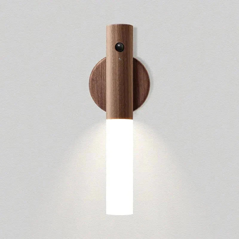 Wooden wall-mounted light fixture on a white background