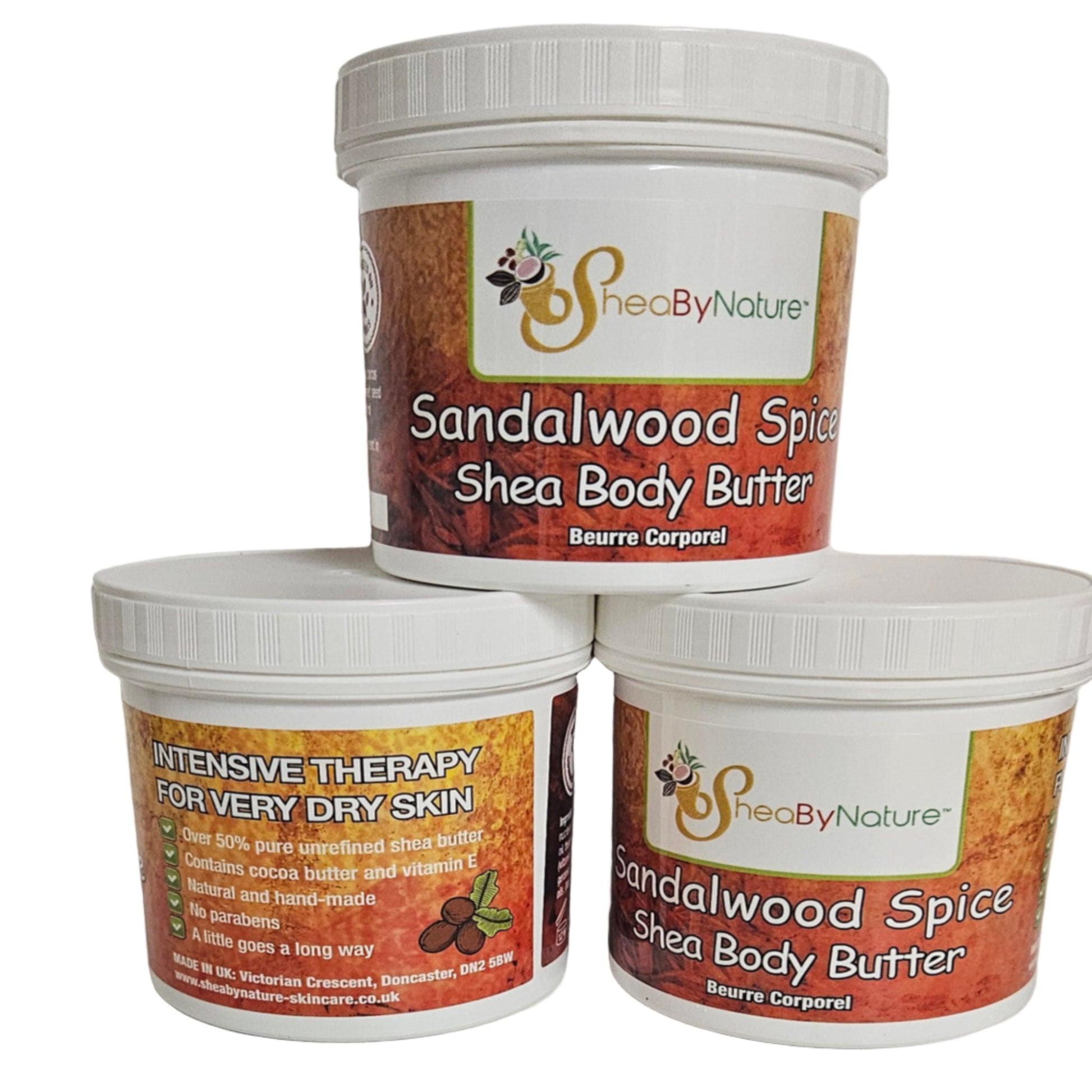 Three containers of Sandalwood Spice Shea Body Butter by Shea By Nature on a white background.
