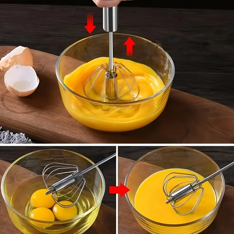 Hand mixer being used to whisk eggs in a glass bowl on a wooden surface.