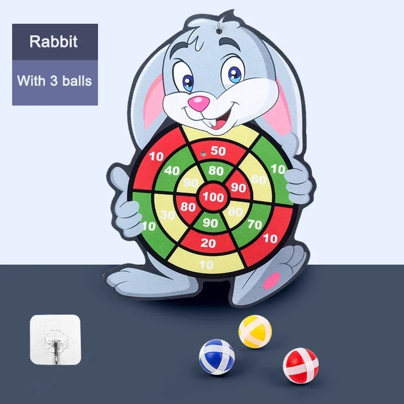 Cartoon rabbit holding a dartboard with three balls on a blue background