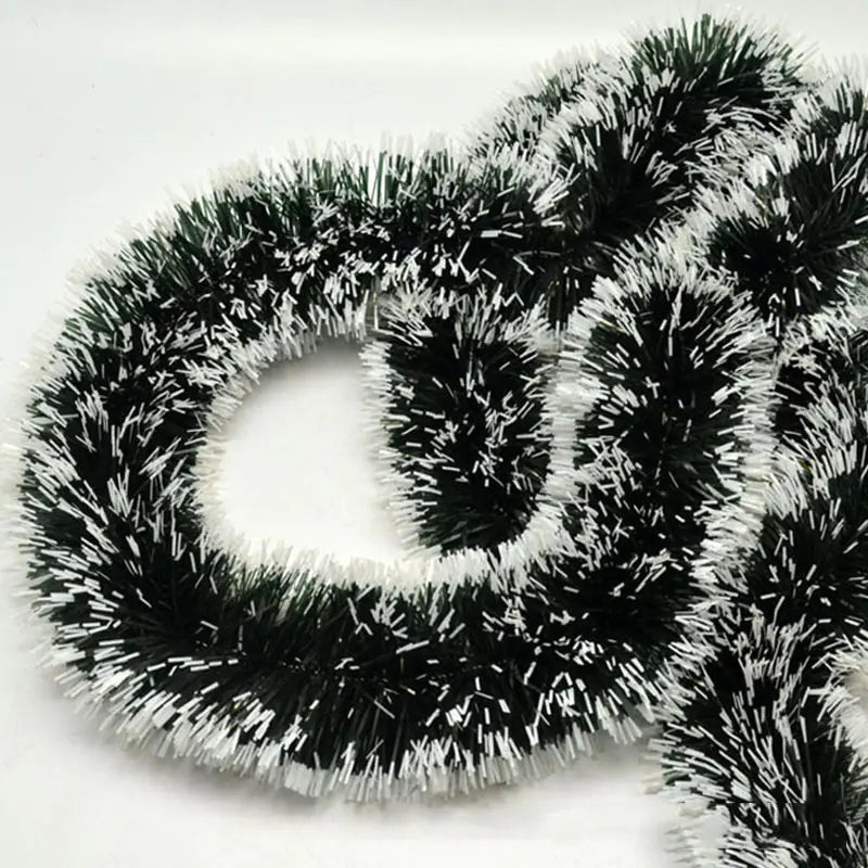 Black tinsel garland on a white background