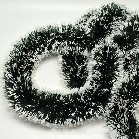 Black tinsel garland on a white background