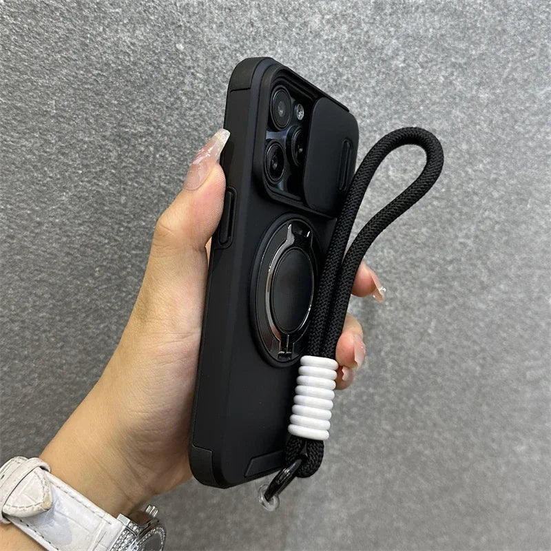 Hand holding a black phone case with a lanyard against a gray background