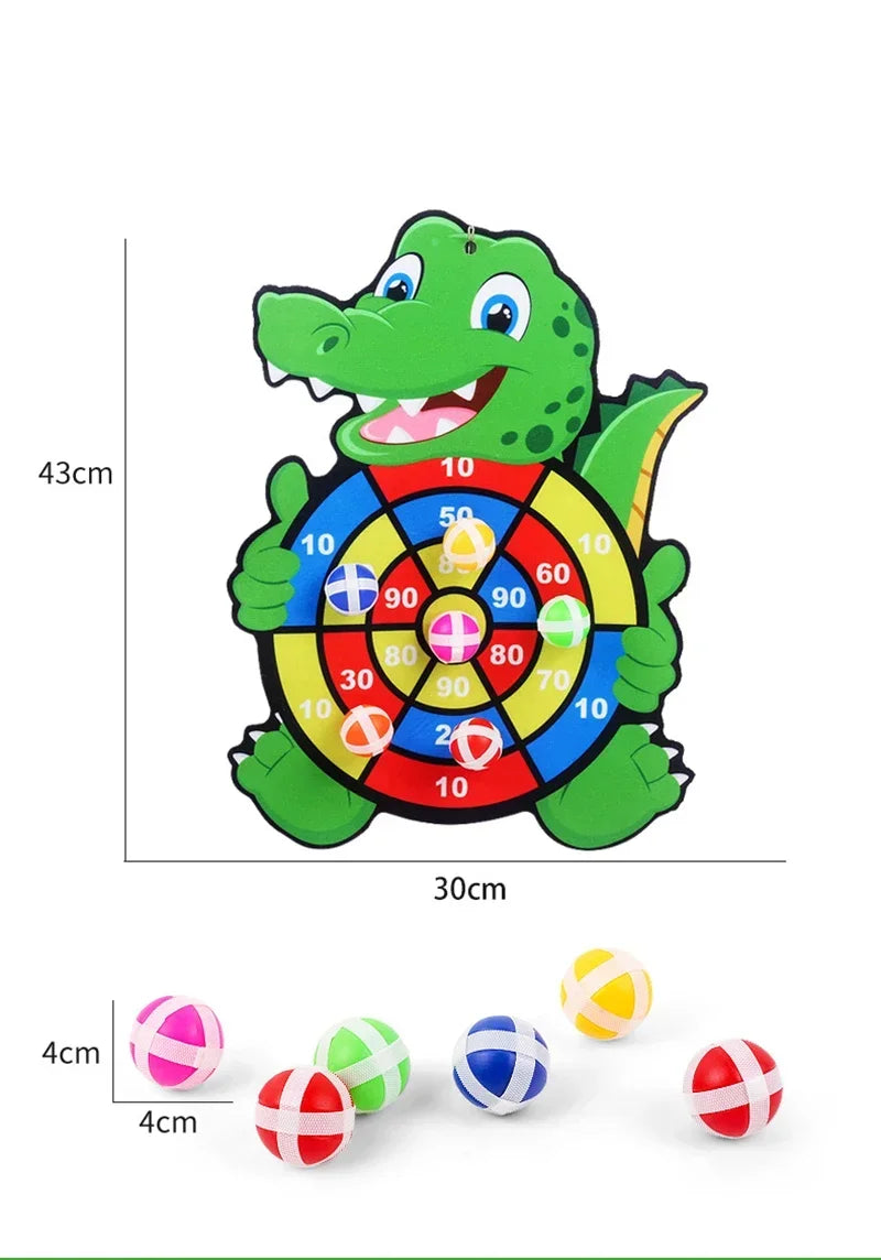 Crocodile-shaped dartboard with colorful darts on a white background