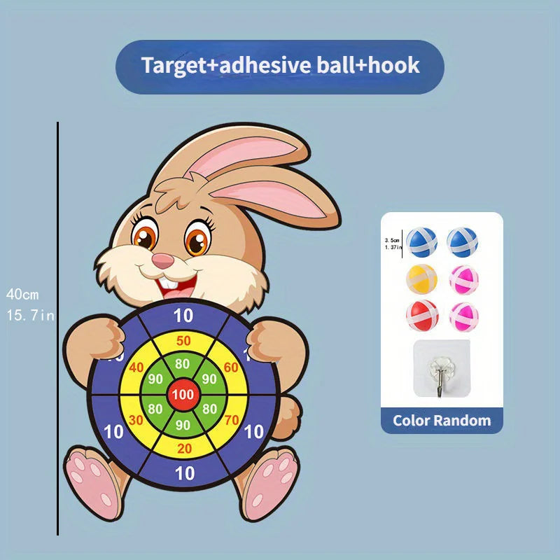 Children's dartboard with cartoon rabbit design on a blue background, featuring adhesive ball and hook.
