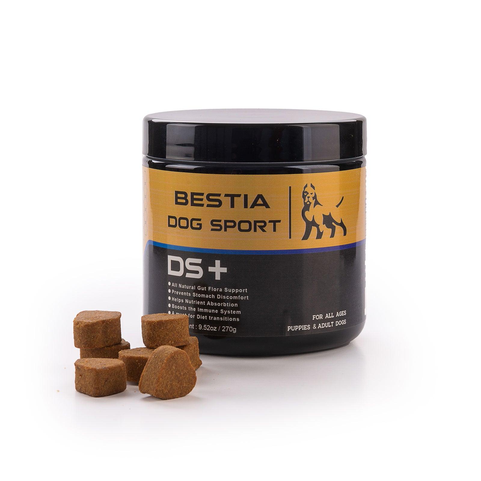 Black and yellow container labeled 'Bestia Dog Sport DS+' with dog treats on a white background