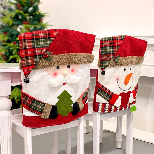 Two Christmas-themed chair covers, one resembling Santa Claus and the other a snowman, on white chairs.