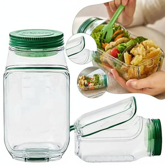 hand with spoon dig in salad jar
