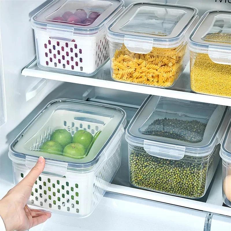 Set of food storage containers with lids in a refrigerator.