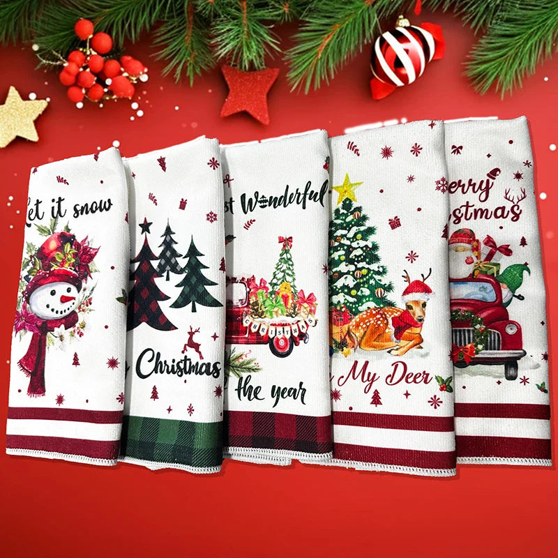 Set of Christmas-themed kitchen towels on a red background with festive decorations.