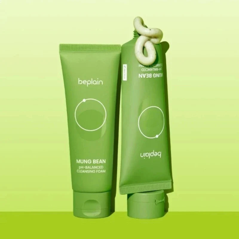 Two green skincare products with 'beplain' branding on a light green background