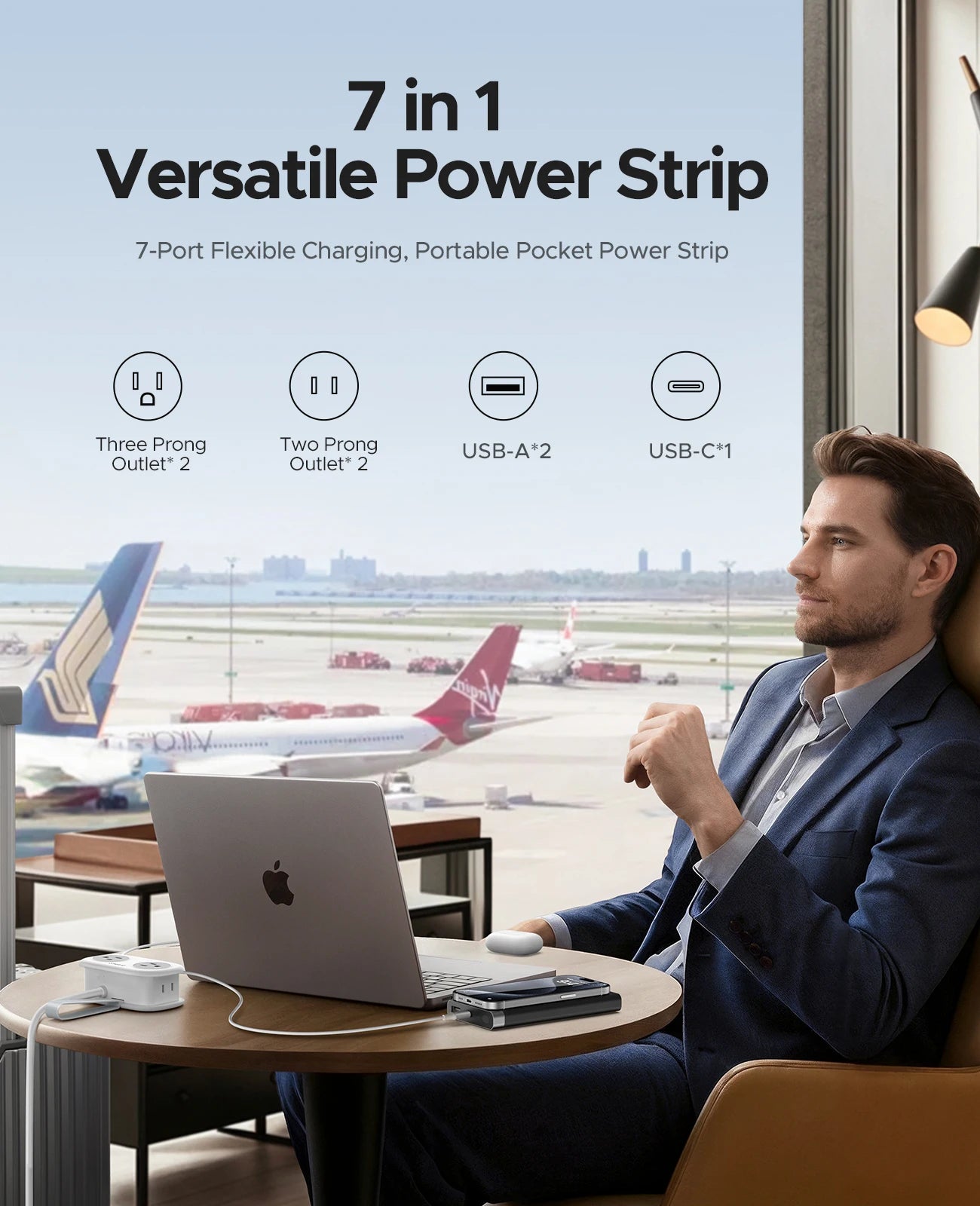 Man using a laptop with a 7-in-1 versatile power strip at an airport.