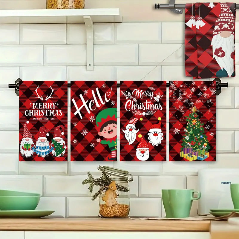Set of Christmas-themed kitchen towels hanging on a rack with a festive kitchen setting below.
