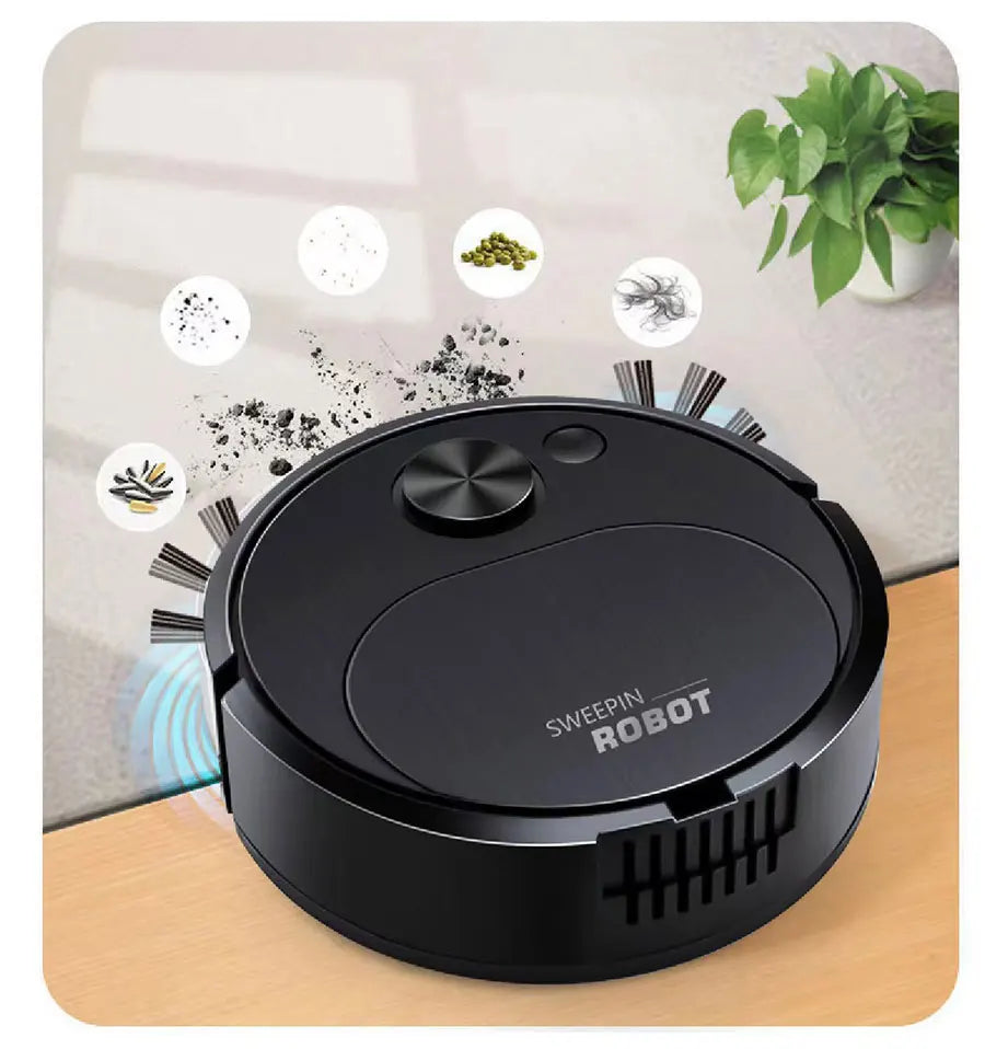 Black robot vacuum cleaner on a wooden surface with a light gray background and green plant.