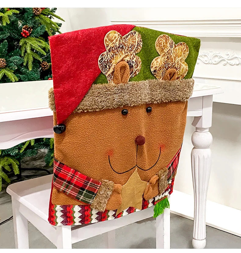 Decorative reindeer chair cover on a white chair with Christmas tree in the background