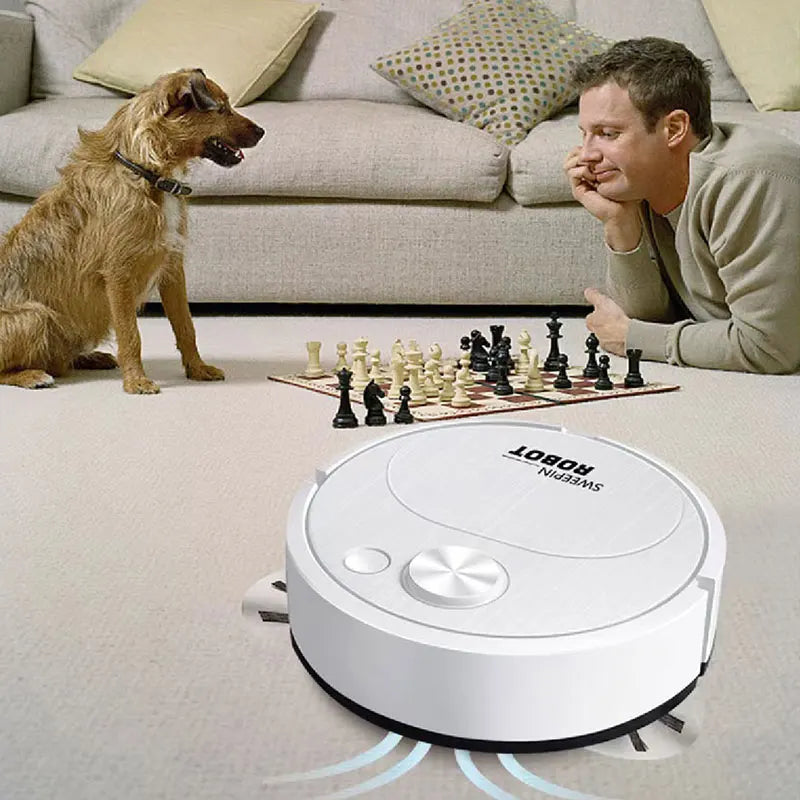 Robotic vacuum cleaner on a carpeted floor with a man and dog in the background.
