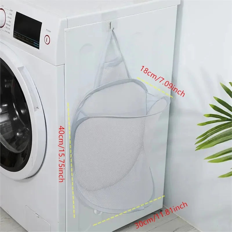 Laundry bag with dimensions displayed in front of a washing machine
