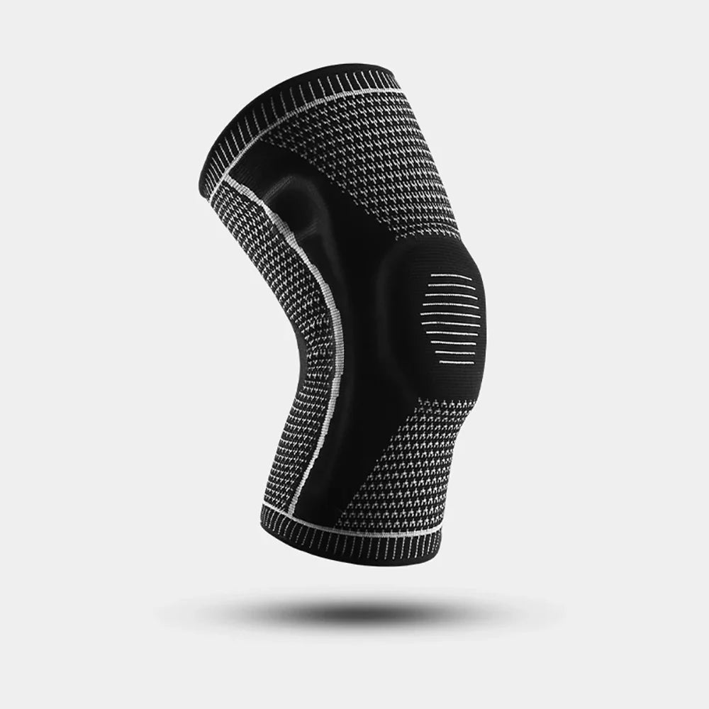 Black knee brace with textured pattern on a light gray background