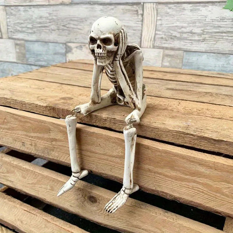 Skeletal figure sitting on a wooden surface with a rustic background