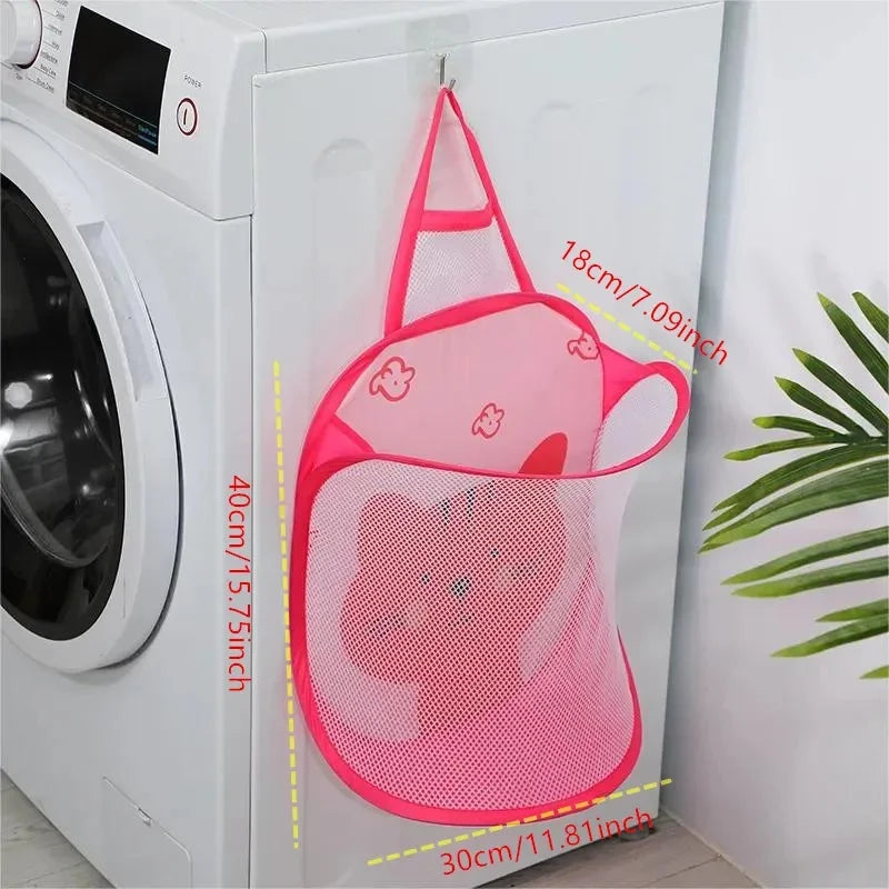 Pink mesh laundry bag with measurements in front of a washing machine