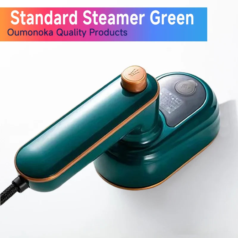 Green steamer with gold accents on a white background, labeled 'Oumanoka Quality Products'.