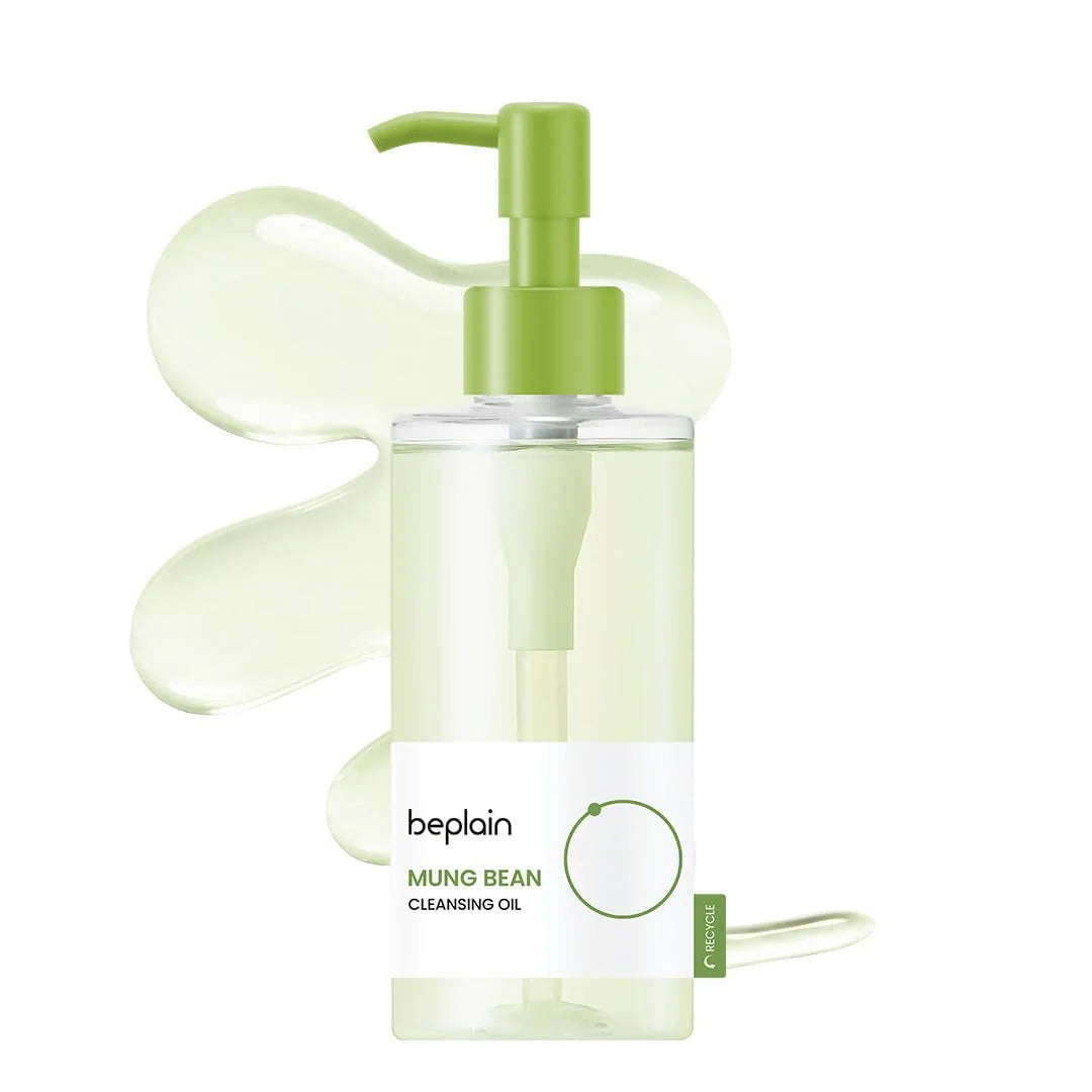 Mung bean cleansing oil bottle with green pump on a white background