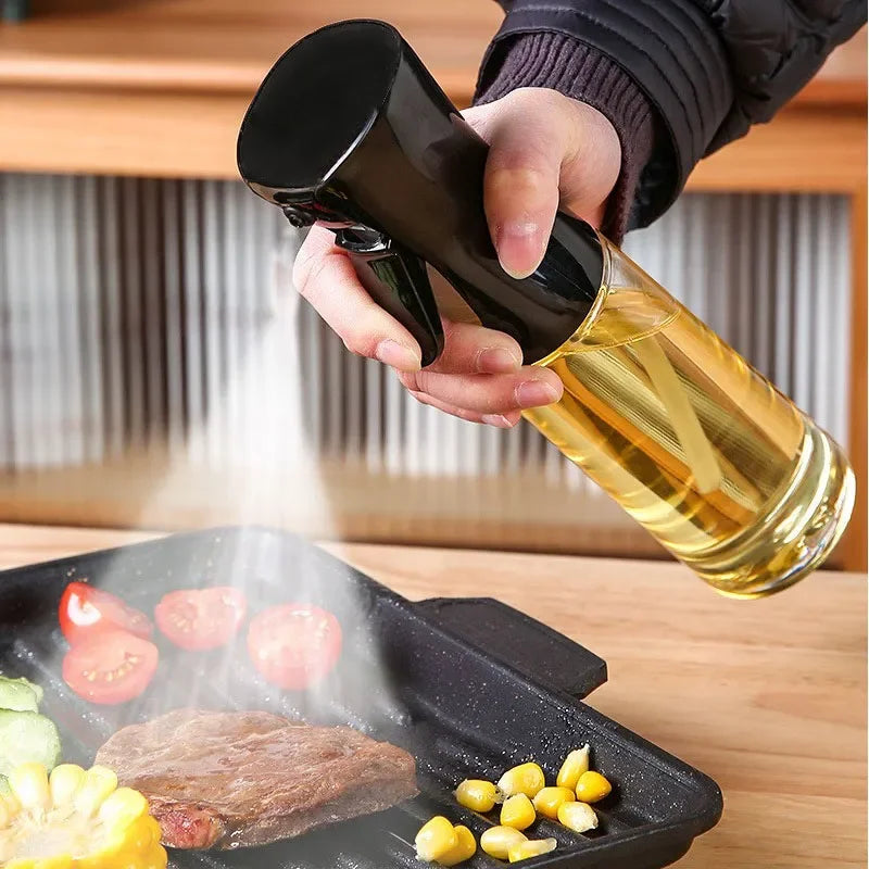 Person pouring oil from a bottle onto a grill with food on a wooden surface