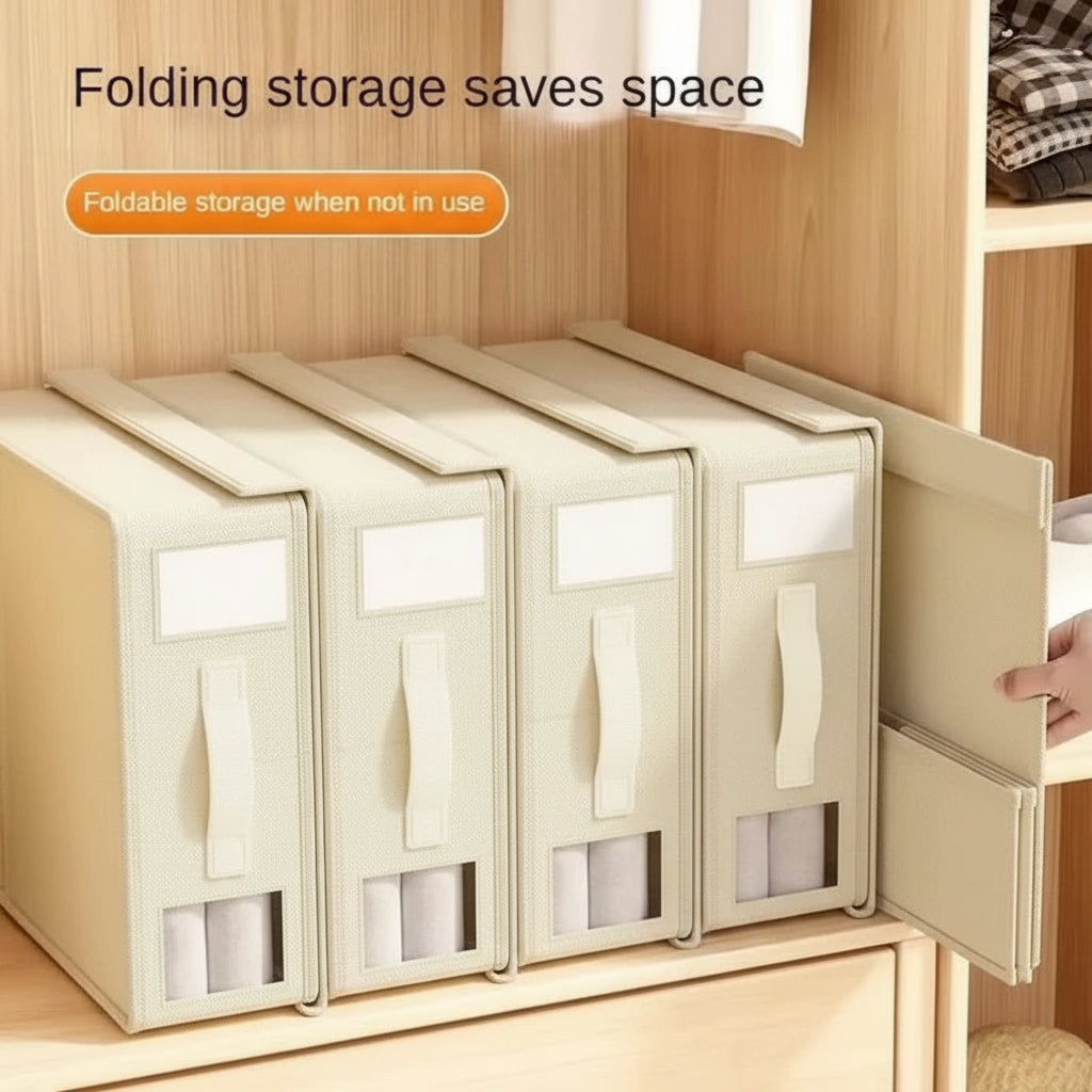 Foldable storage boxes labeled with text on a wooden shelf.