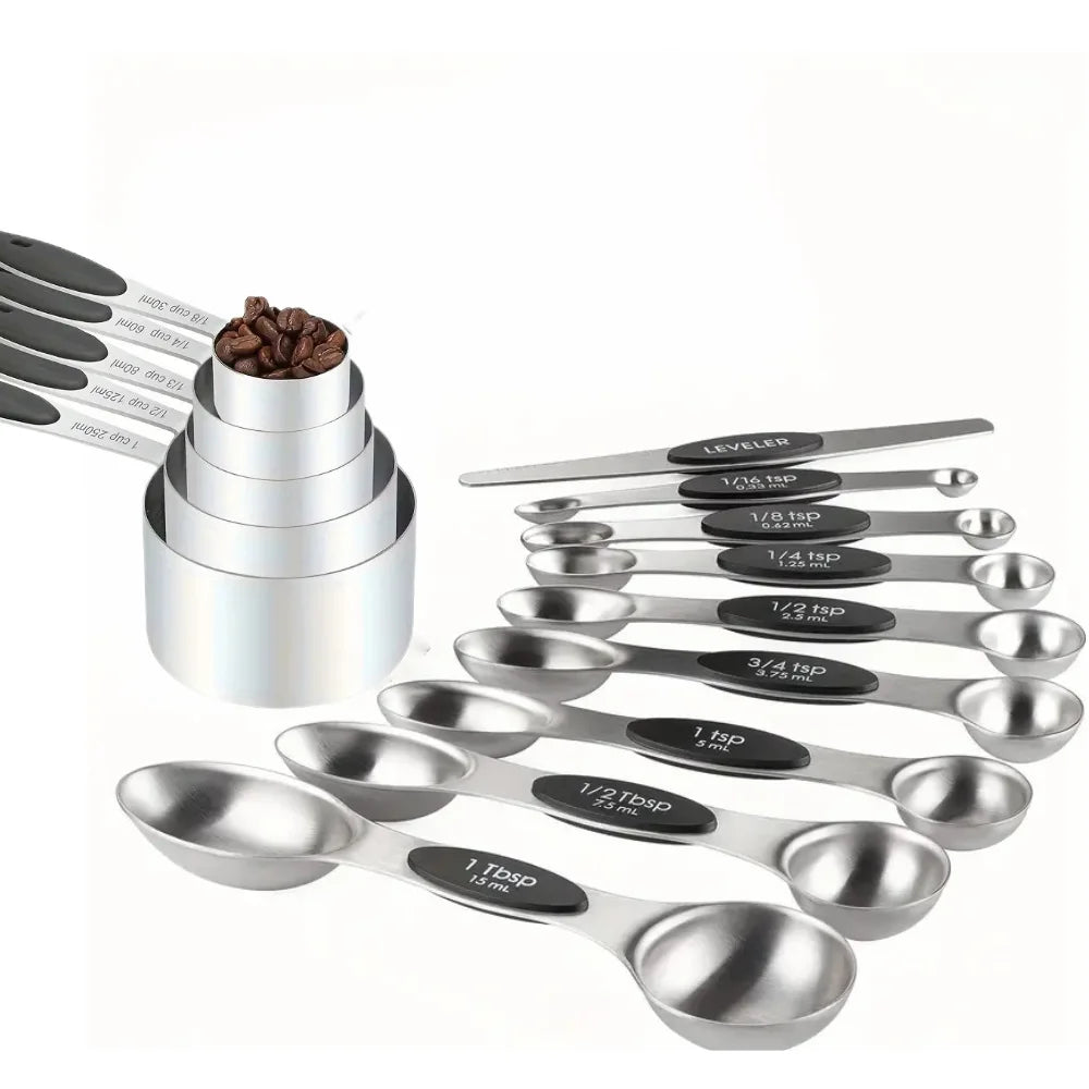 Set of stainless steel measuring spoons with labels on a white background