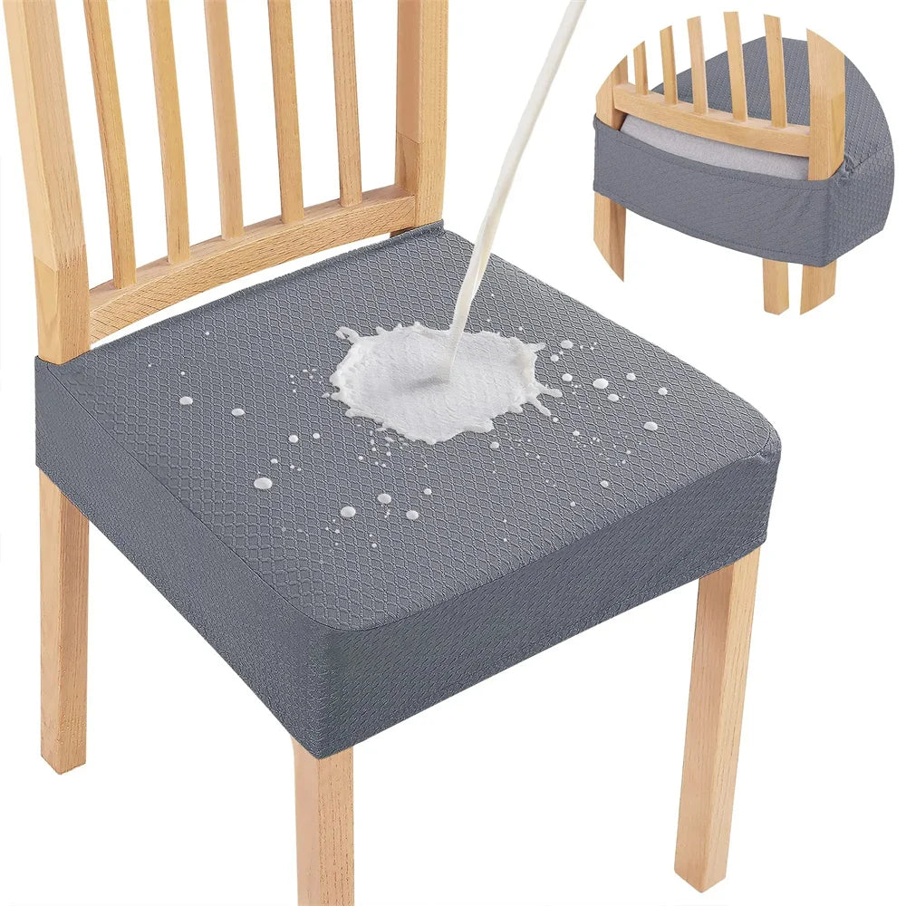 Gray chair cushion with a water spill design on a wooden chair.