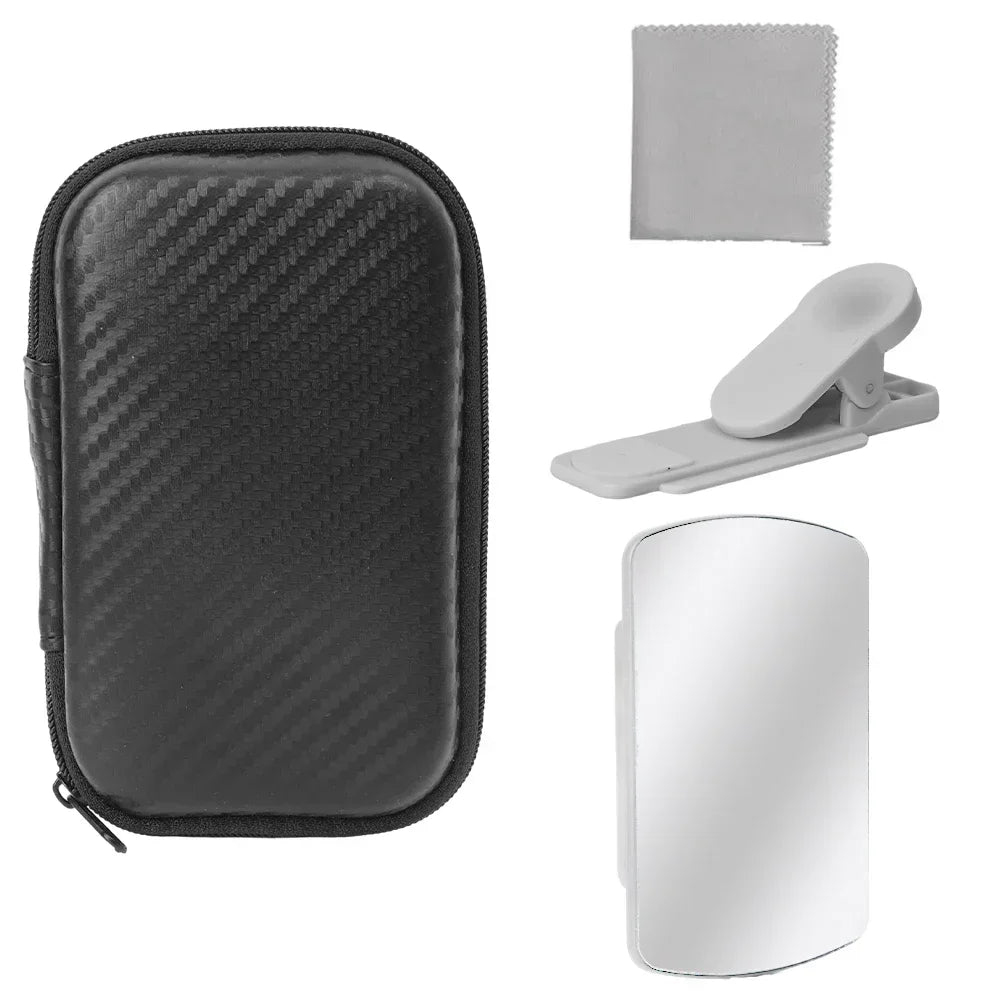 Black zippered case, white mirror, gray cleaning cloth, and white clip on a white background