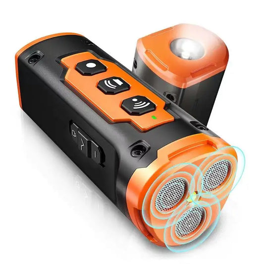 Orange and black electronic device with buttons and a light on a white background
