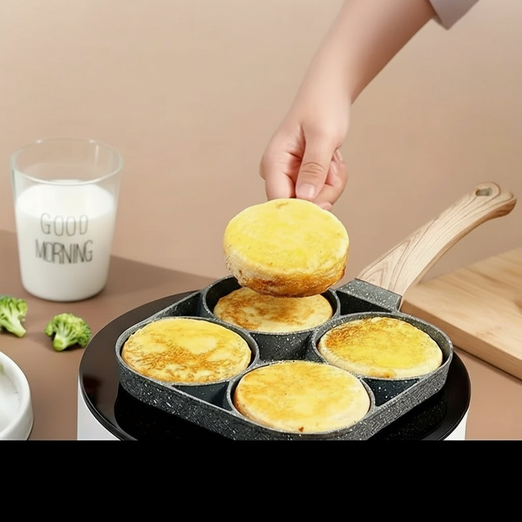 Multifunctional pan with four sections being used to cook pancakes, with text indicating compatibility with various stovetops.