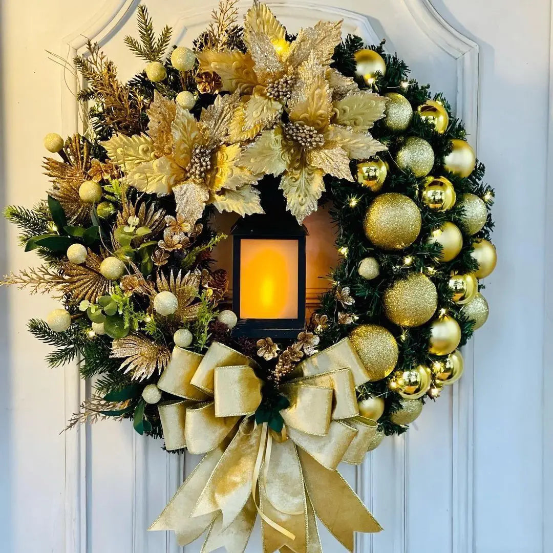 Decorative wreath with gold and green ornaments on a door