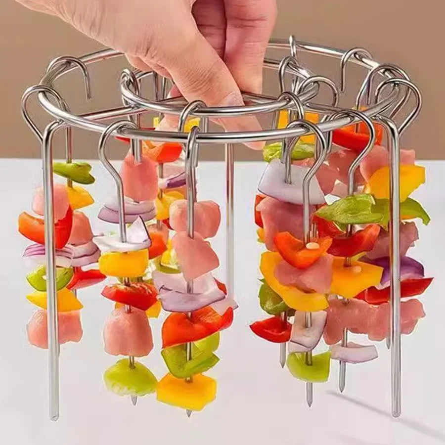 Metal skewer holder with colorful skewers on a white surface