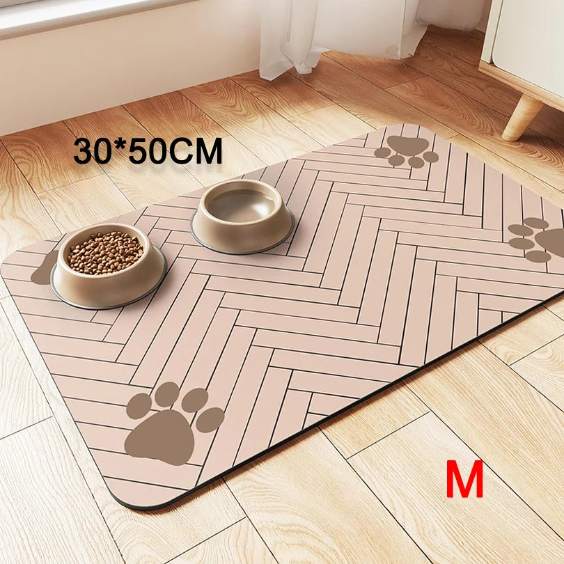 Pet mat with paw prints and two bowls on a wooden floor