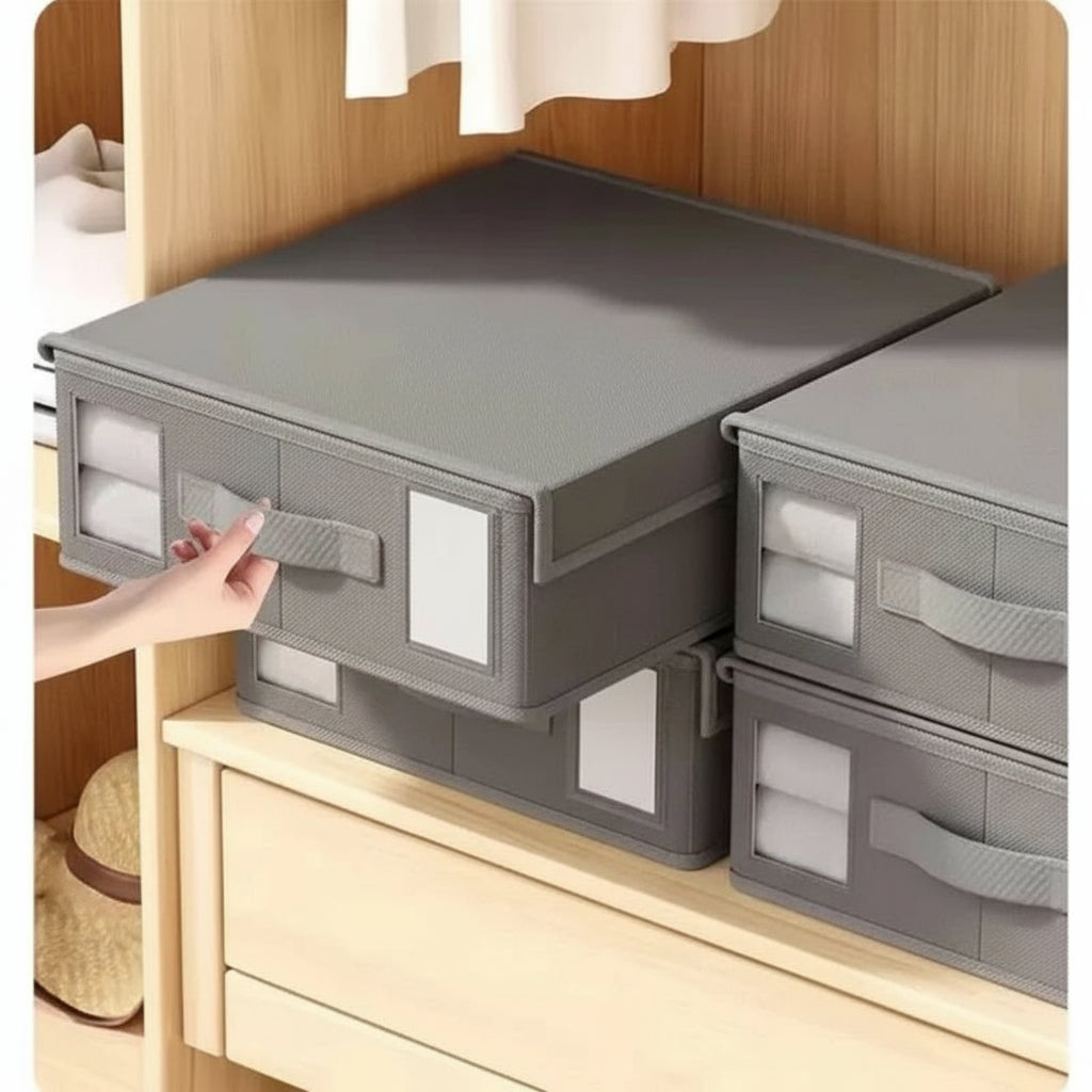 Gray storage boxes with labels on a wooden shelf