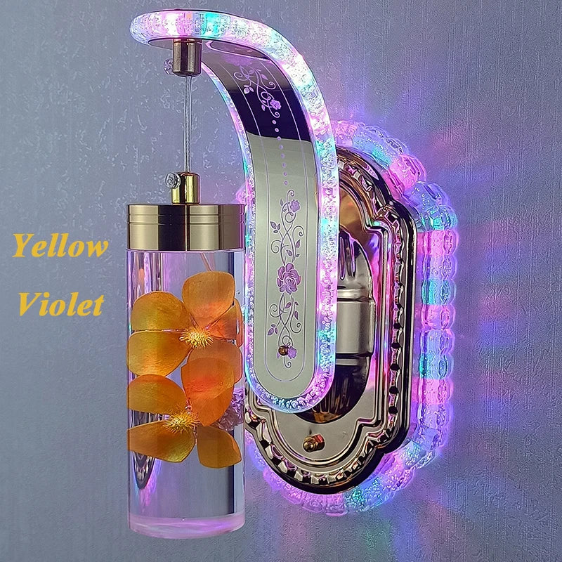 Decorative wall clock with colorful LED lights and a floral design on a gray background.