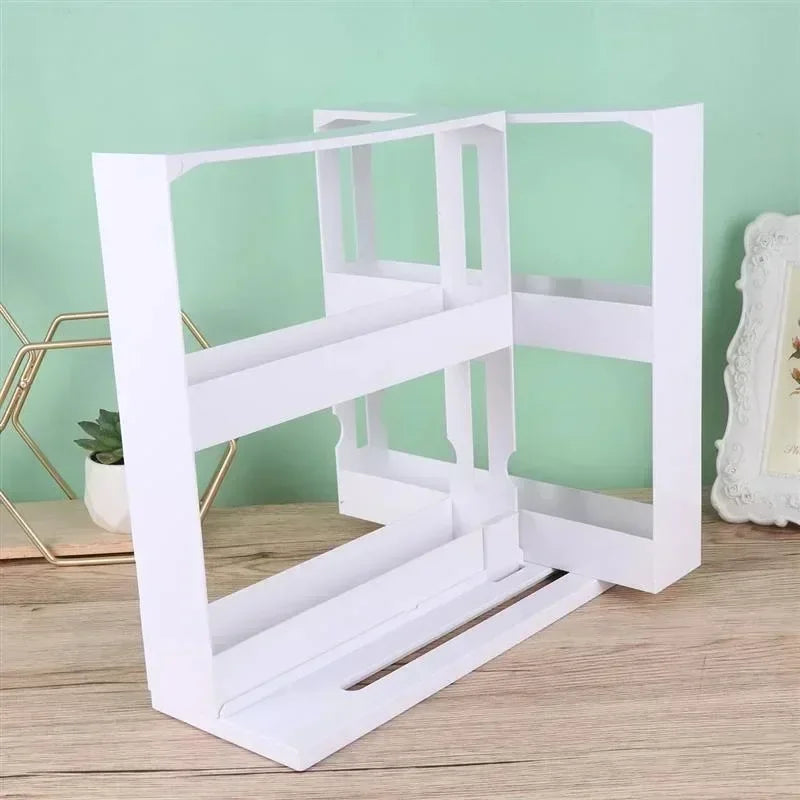 White geometric shelf against a light green wall with decorative elements.
