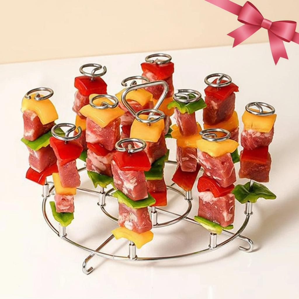 Air fryer barbecue grill with skewers of meat and vegetables on a white background