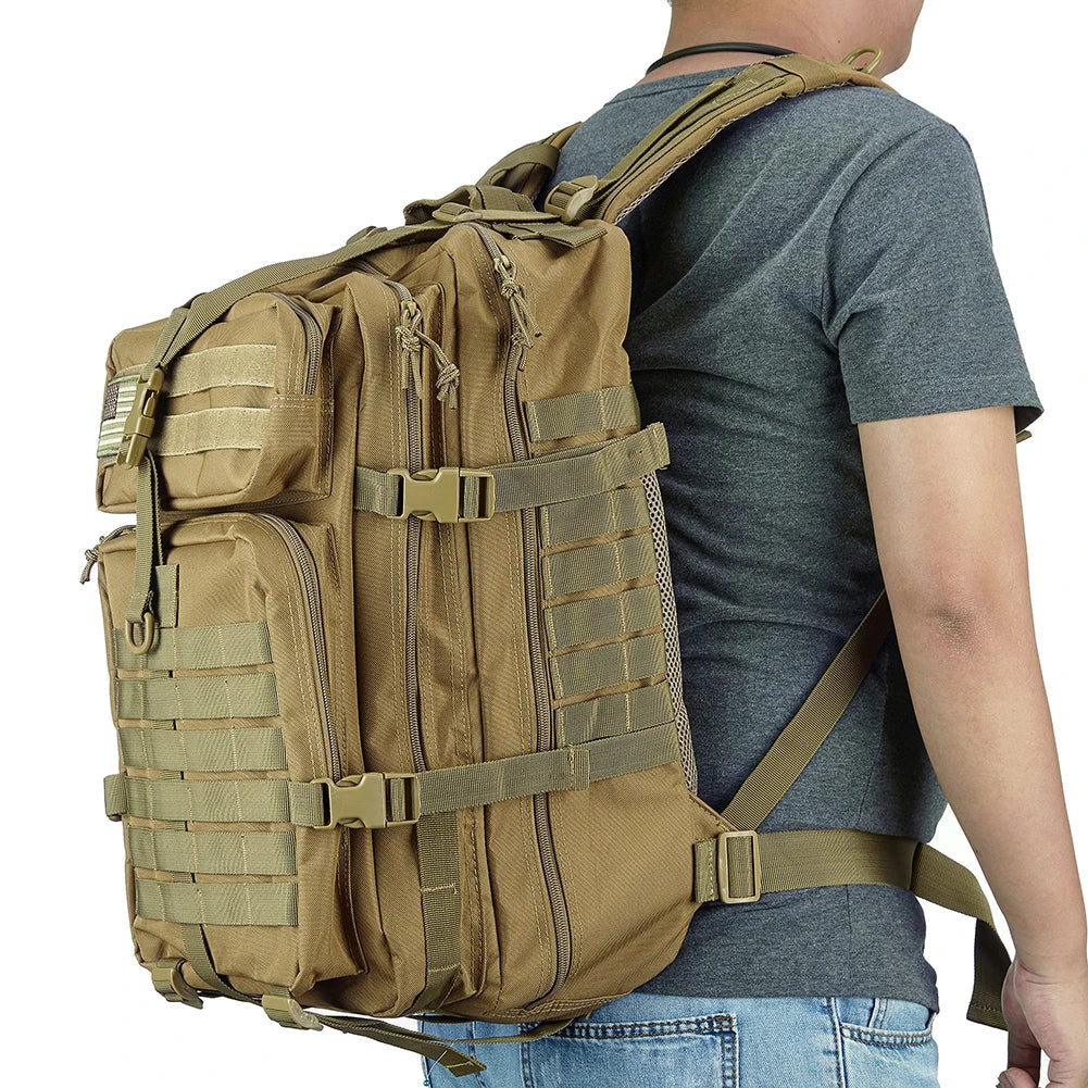 Person wearing a tan tactical backpack on a white background