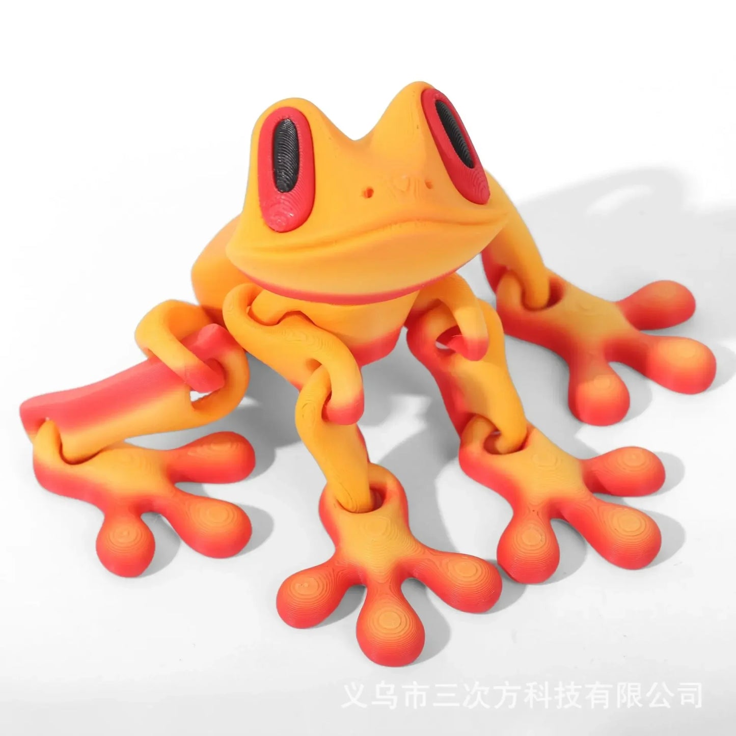 Toy frog with a digital screen on a white background