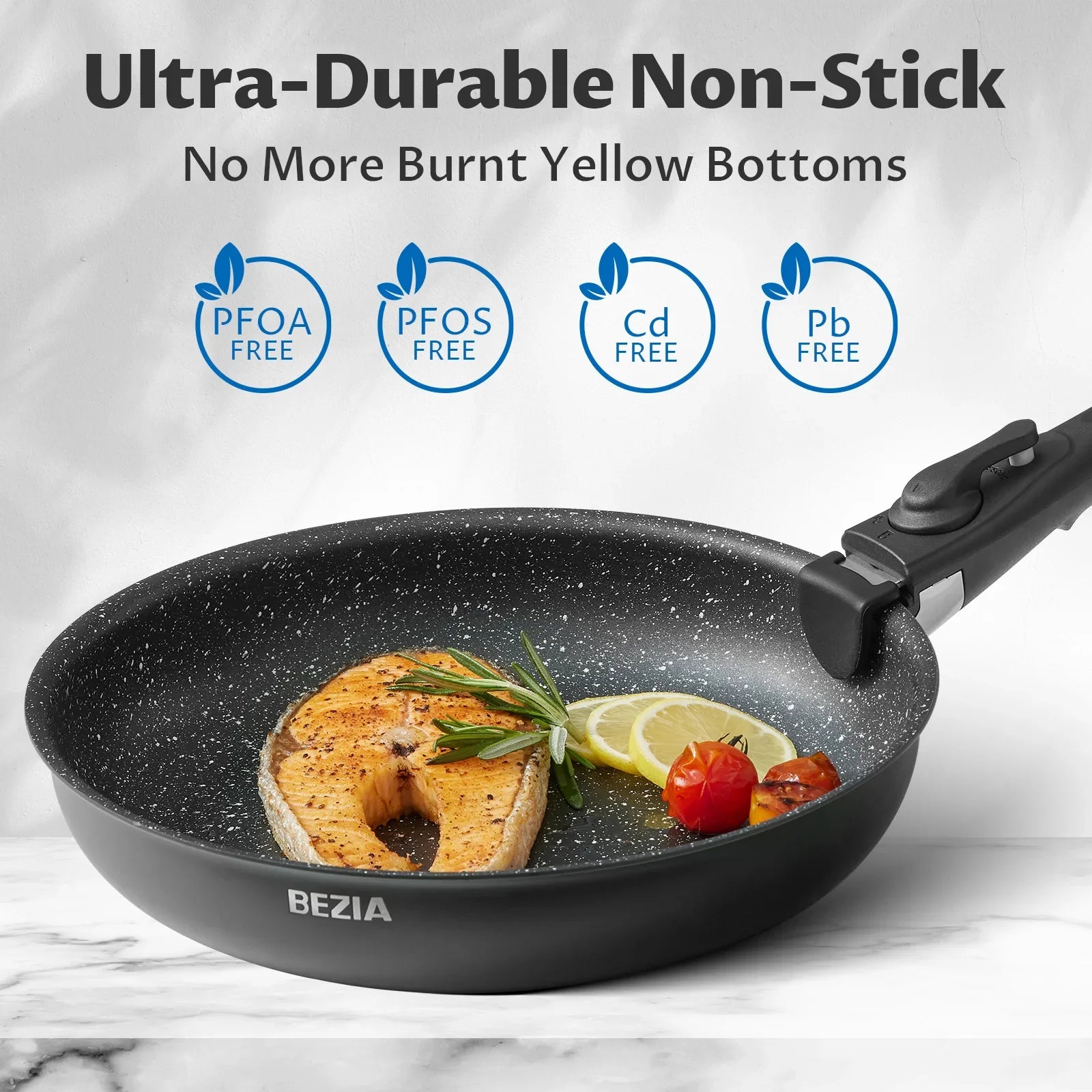 Black frying pan with cooked salmon and vegetables on a marble surface, featuring BEZIA branding and text about non-stick properties.