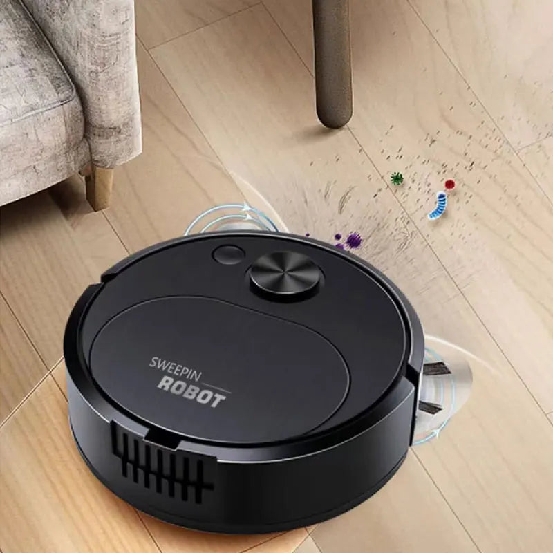 Black robot vacuum cleaner on a wooden floor with furniture in the background