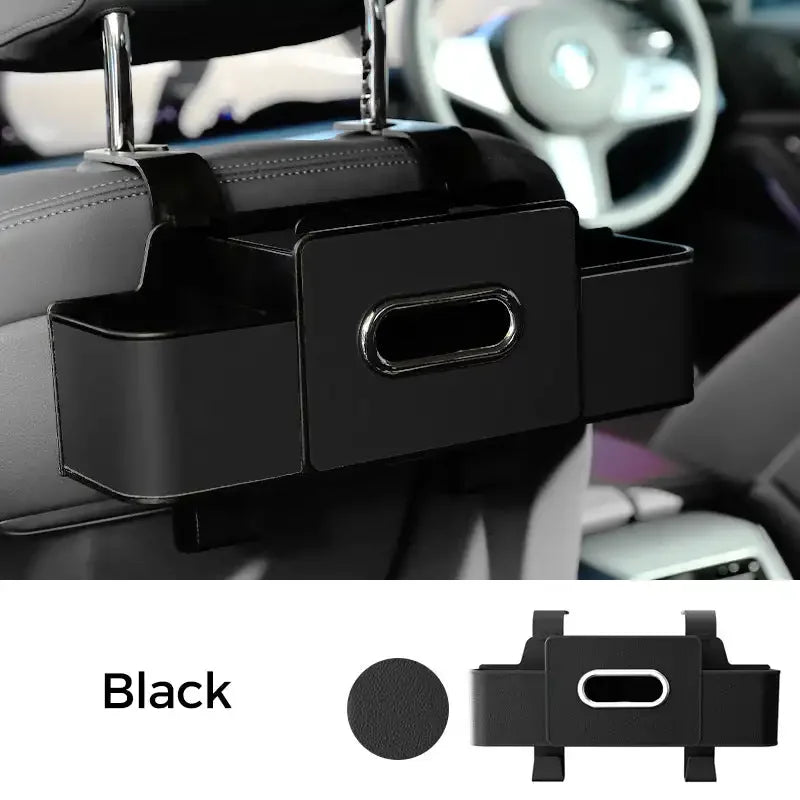 Black car organizer mounted on a car's dashboard with steering wheel in the background.
