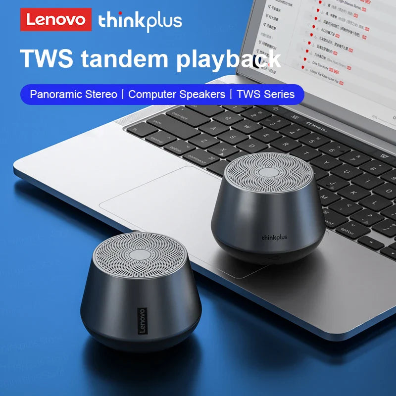 Lenovo thinkplus TWS tandem playback speakers in front of a laptop on a blue background