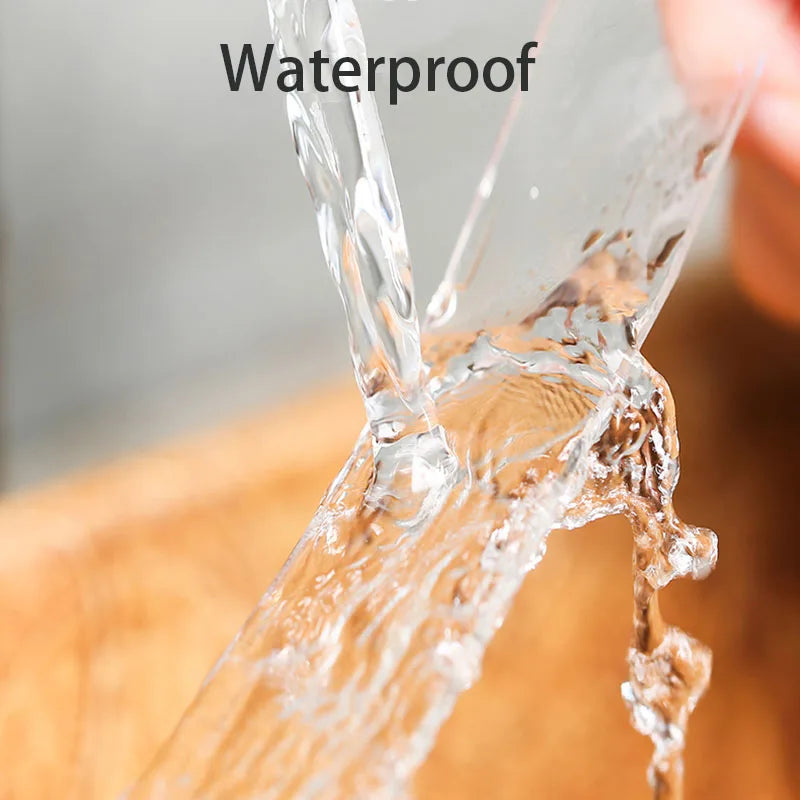 Water splashing onto a surface with 'Waterproof' text overlay