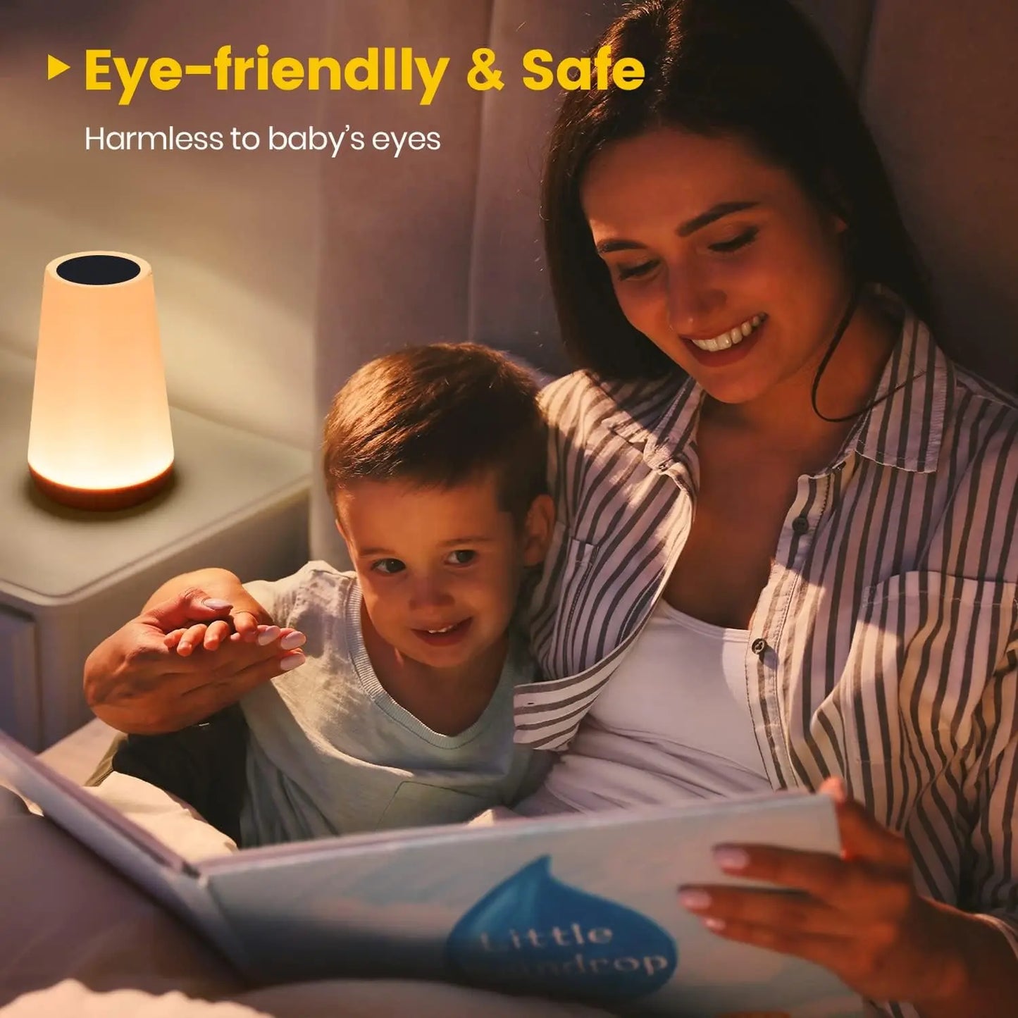 Woman and child reading a book together with a night light on a nightstand.